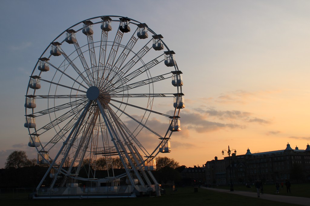 The Cambridge Ferris wheel on Parker's Piece at sunset.  