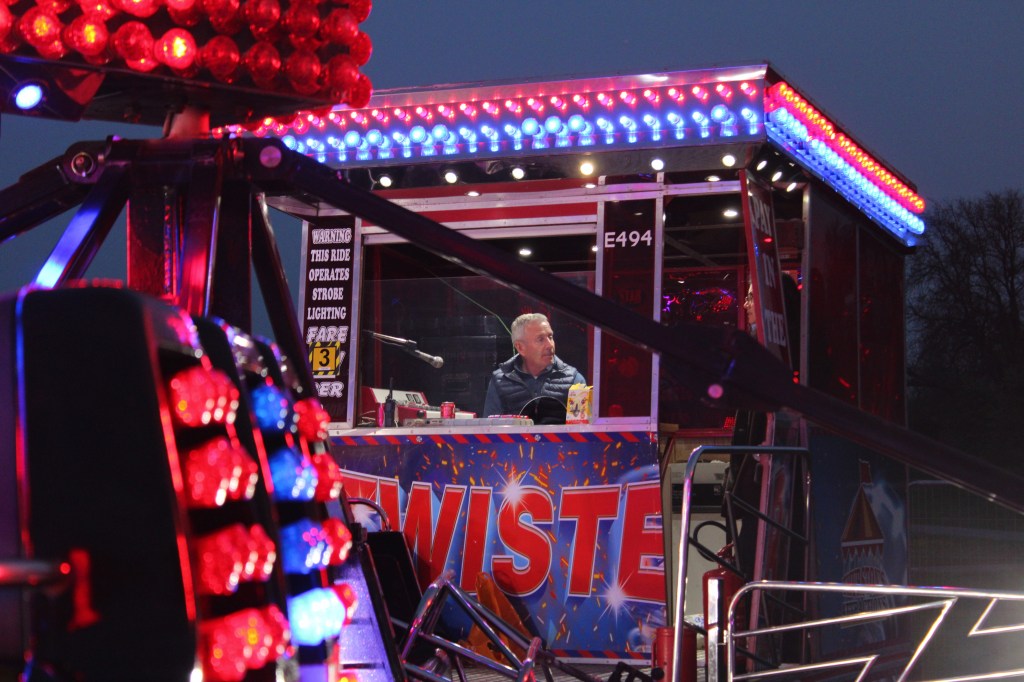 Stanley can be seen from afar in the control room. 